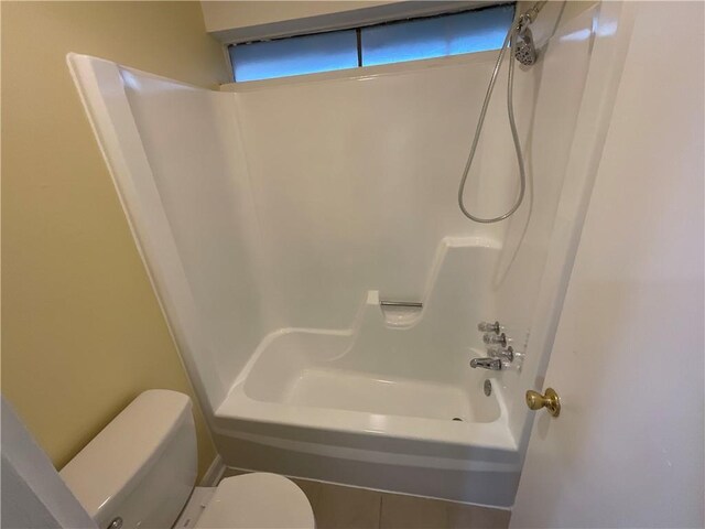 full bath featuring shower / bathtub combination and toilet