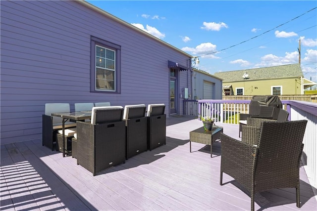 1026 Delaronde St, New Orleans, LA 70114 - wooden terrace featuring outdoor dining area