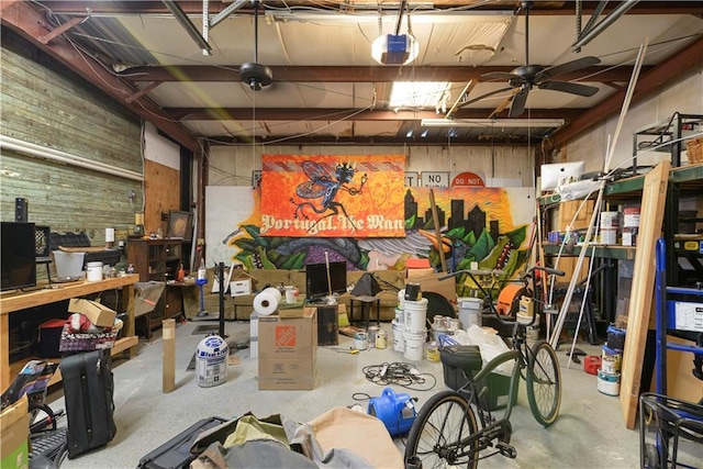 storage featuring a garage and ceiling fan