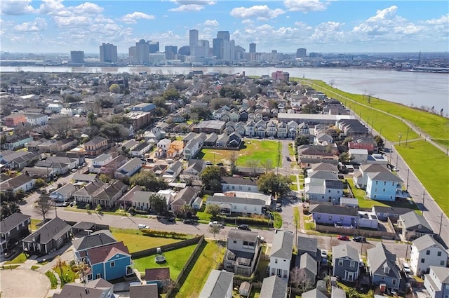 aerial view featuring a view of city, a water view, and a residential view