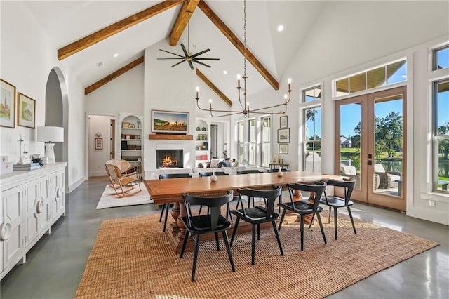 23648 Goodlife Ln, Covington, LA 70435 - dining space featuring high vaulted ceiling, a lit fireplace, finished concrete flooring, beam ceiling, and recessed lighting