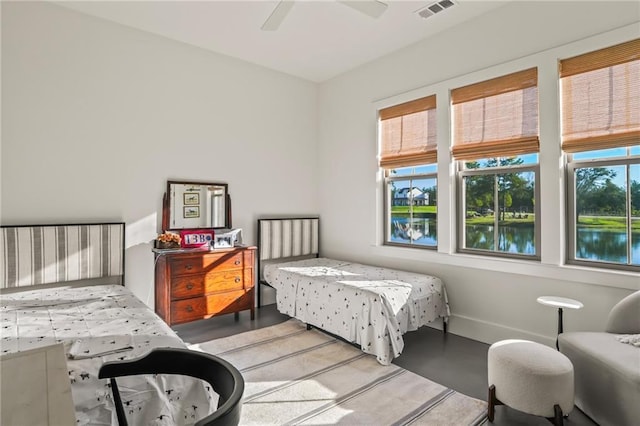 23648 Goodlife Ln, Covington, LA 70435 - bedroom with finished concrete floors and ceiling fan