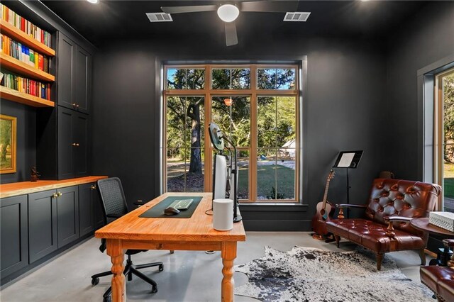 23648 Goodlife Ln, Covington, LA 70435 - office space with finished concrete flooring and a ceiling fan