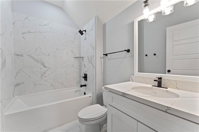 bathroom with toilet, lofted ceiling, marble finish floor, vanity, and washtub / shower combination