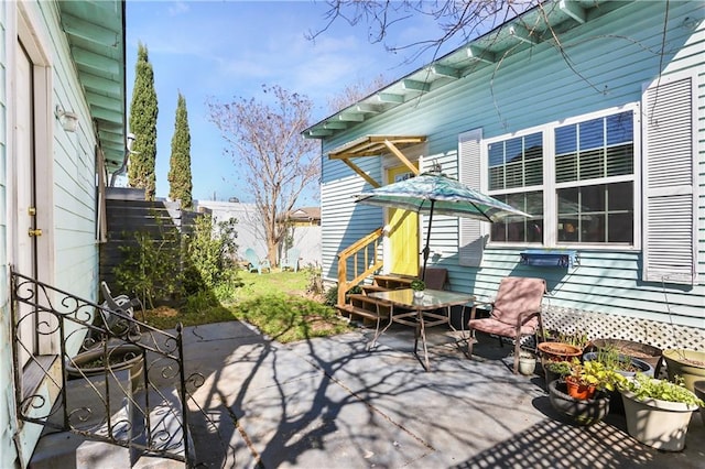 view of patio with fence