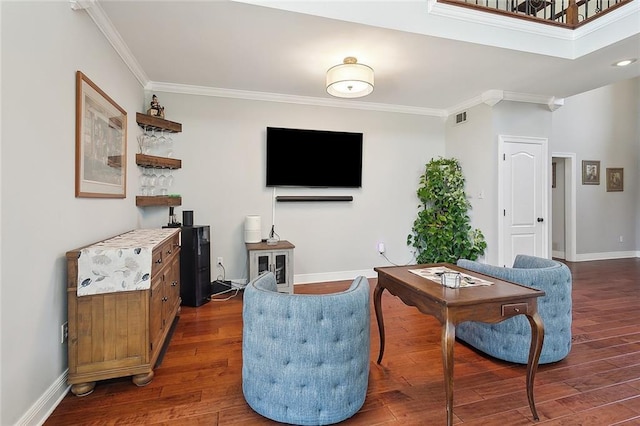 living area featuring wood-type flooring, visible vents, and crown molding