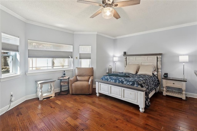 bedroom featuring a textured ceiling, hardwood / wood-style floors, crown molding, and baseboards