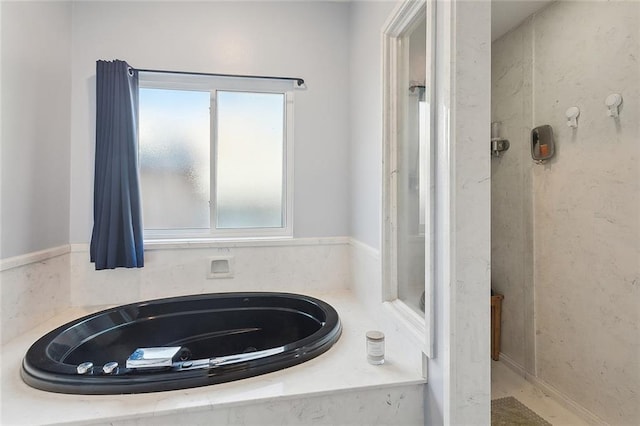 full bath featuring a garden tub