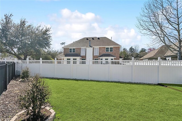 view of yard featuring a fenced backyard