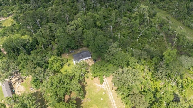 aerial view featuring a view of trees