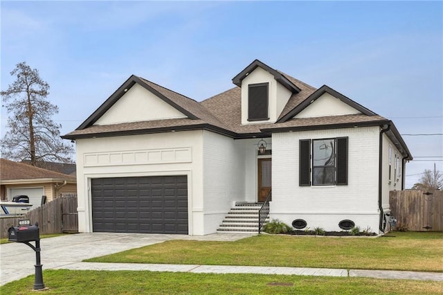 view of front of property with driveway, a garage, fence, and brick siding