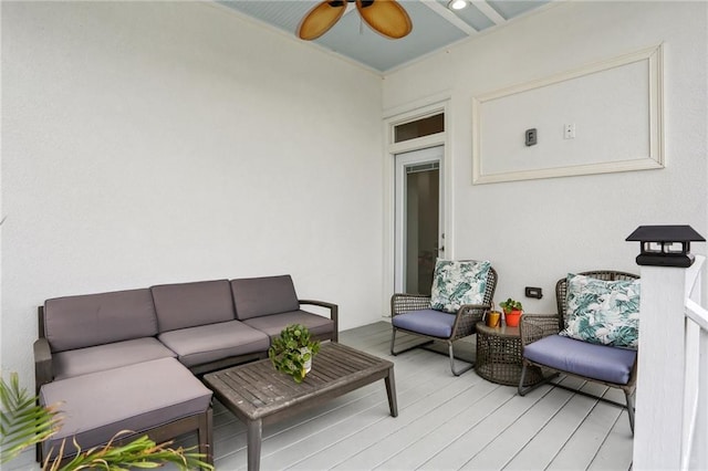 living area featuring ceiling fan and light wood-style flooring