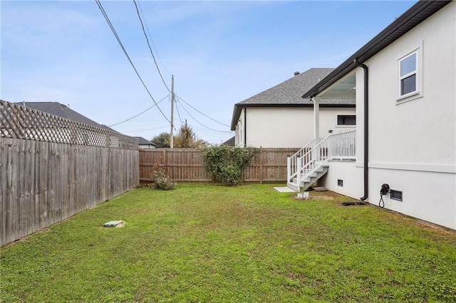 view of yard featuring a fenced backyard