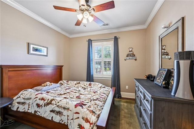 bedroom with visible vents, baseboards, dark wood-type flooring, and ornamental molding