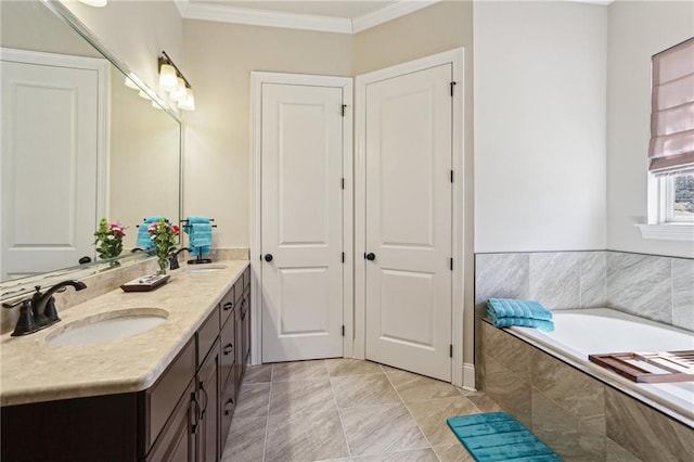 bathroom with a garden tub, double vanity, a sink, and crown molding