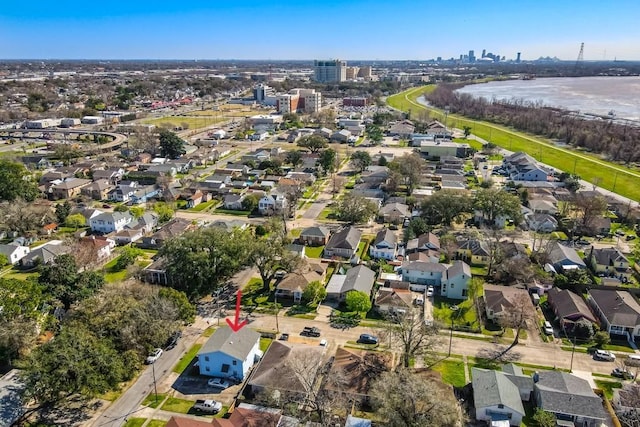 bird's eye view featuring a residential view, a water view, and a city view