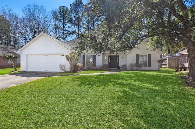 ranch-style house featuring a front yard, brick siding, driveway, and an attached garage