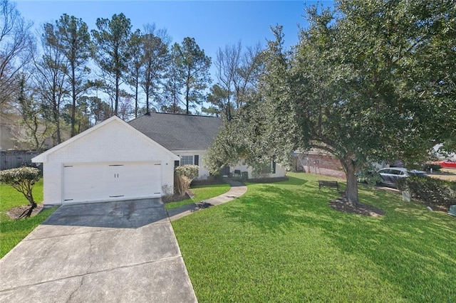 ranch-style home with concrete driveway, brick siding, an attached garage, and a front lawn