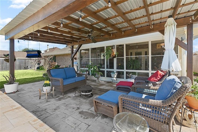 2243 E Canterbury Dr, La Place, LA 70068 - view of patio / terrace with a ceiling fan, a sunroom, fence, and an outdoor living space
