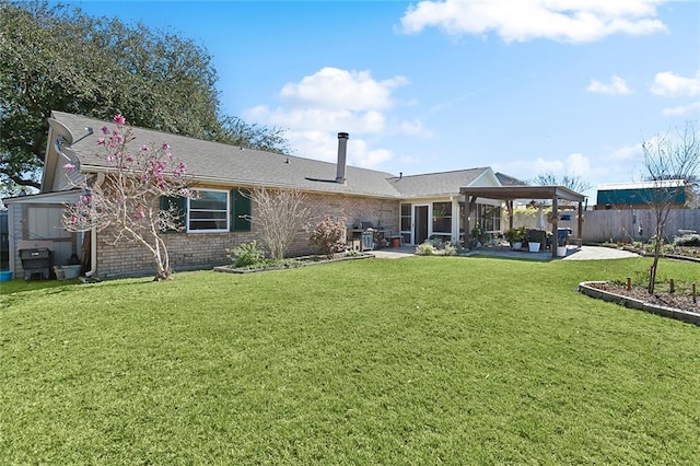 2243 E Canterbury Dr, La Place, LA 70068 - rear view of house featuring brick siding, a yard, a gazebo, a patio area, and fence