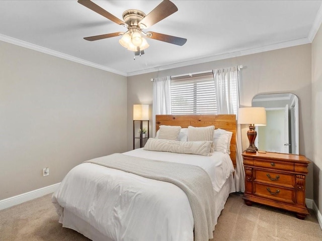 bedroom featuring ornamental molding, light colored carpet, and baseboards