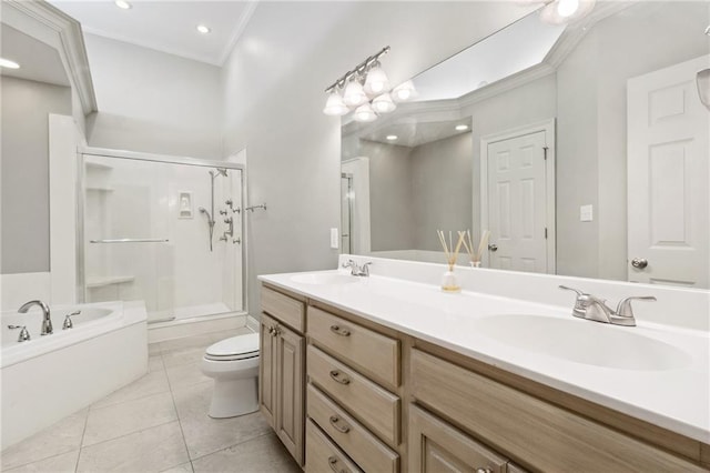 bathroom with ornamental molding, a stall shower, tile patterned flooring, and a sink