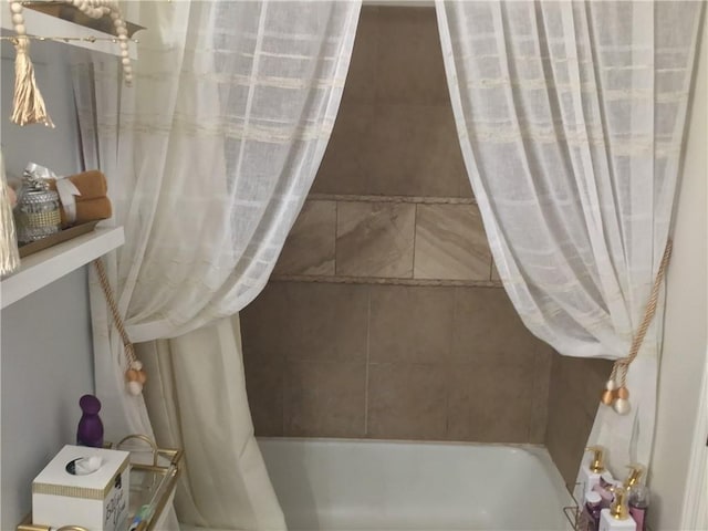 full bathroom with shower / tub combo