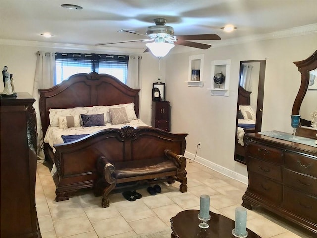 bedroom featuring light tile patterned floors, baseboards, and crown molding