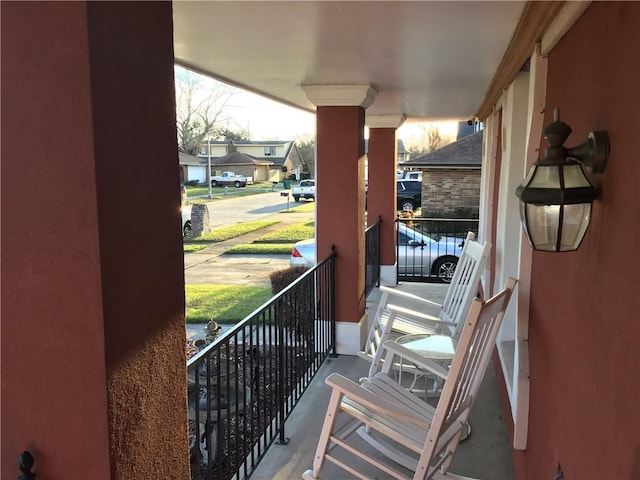 balcony with a porch and a residential view