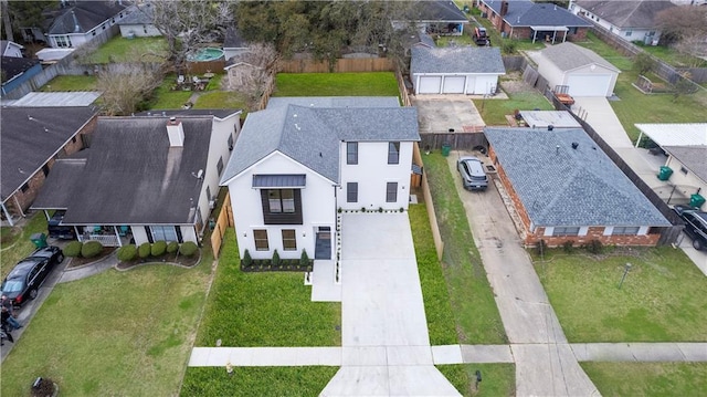 birds eye view of property with a residential view