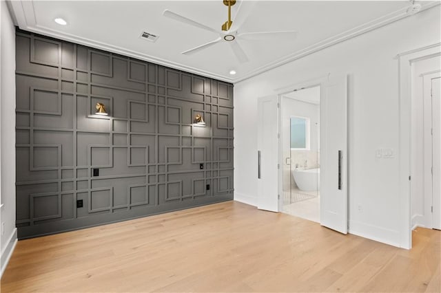 view of home's community featuring ceiling fan and visible vents