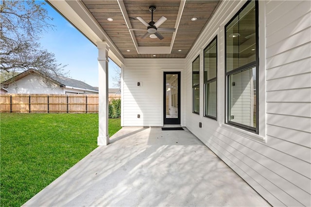 view of patio / terrace featuring fence and a ceiling fan