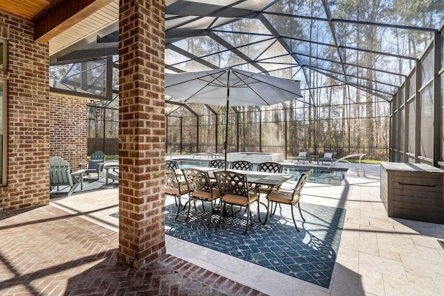 view of patio featuring a fenced in pool, outdoor dining area, and glass enclosure