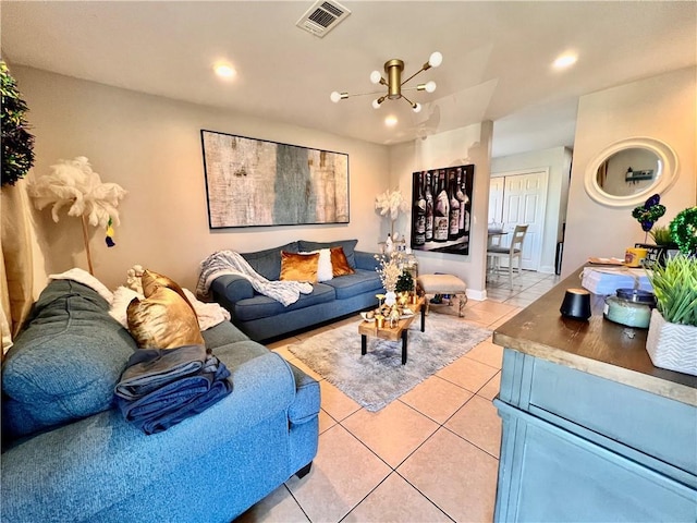 living area featuring light tile patterned floors, visible vents, and recessed lighting