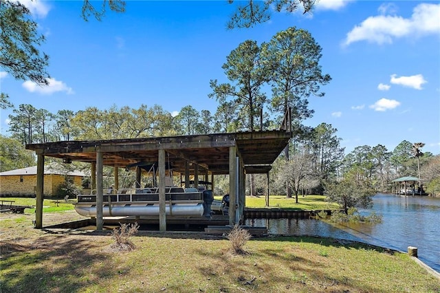 view of dock featuring a water view and a lawn