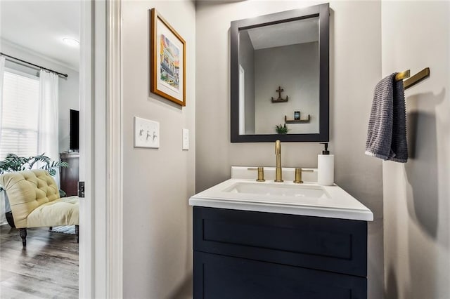 bathroom featuring vanity and wood finished floors