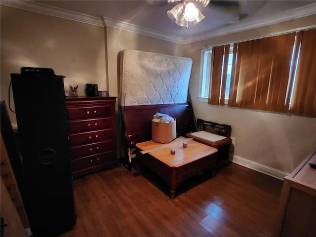 bedroom featuring baseboards, ornamental molding, ceiling fan, and wood finished floors