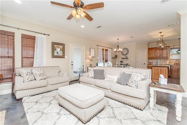 living area featuring recessed lighting, visible vents, ornamental molding, baseboards, and ceiling fan with notable chandelier