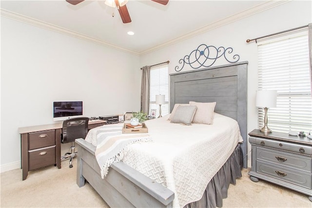 bedroom featuring baseboards, ornamental molding, a ceiling fan, and light colored carpet