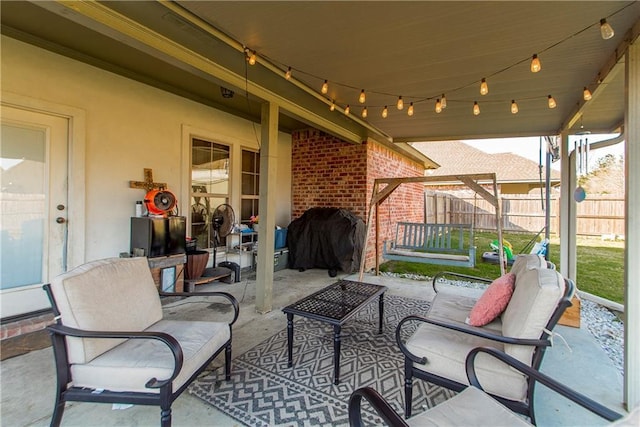 view of patio with fence