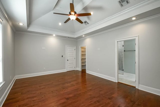 unfurnished bedroom with a raised ceiling, visible vents, and recessed lighting