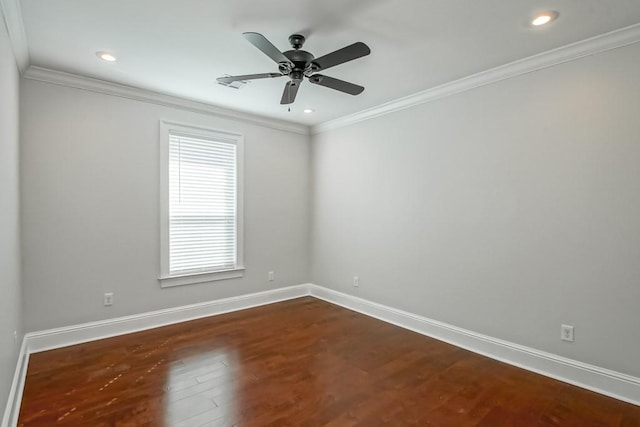 unfurnished room with baseboards, ceiling fan, dark wood-style flooring, crown molding, and recessed lighting