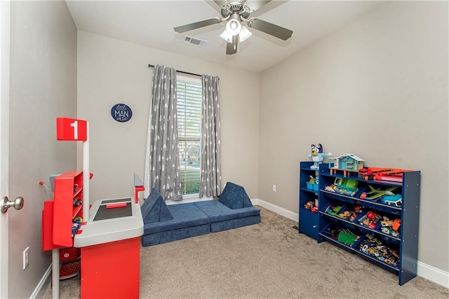 rec room featuring carpet floors, baseboards, and visible vents