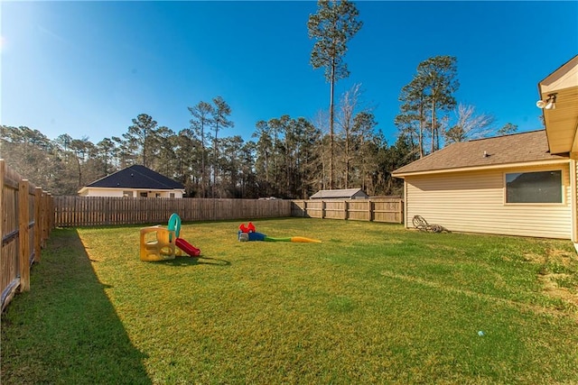 view of yard with a fenced backyard