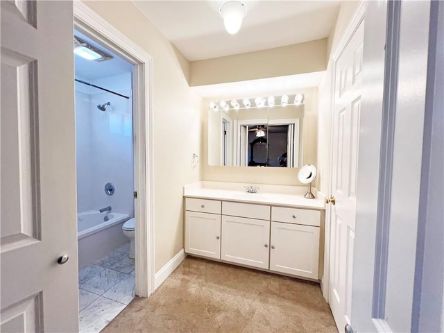 full bathroom with shower / bath combination, vanity, toilet, and baseboards