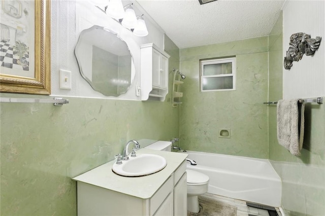 bathroom with toilet, shower / tub combination, a textured ceiling, and vanity