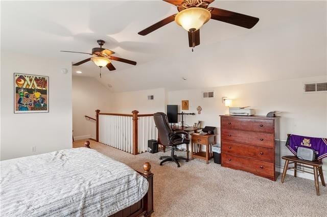 bedroom with visible vents, vaulted ceiling, a ceiling fan, and light colored carpet