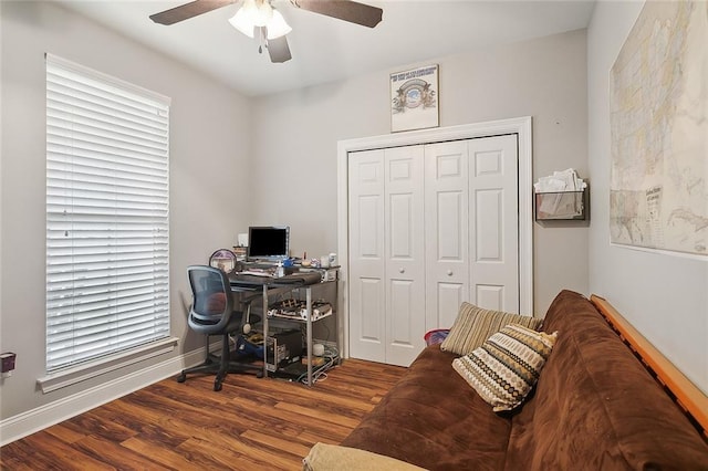 home office with ceiling fan, wood finished floors, and baseboards