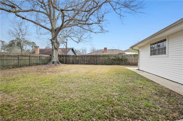 view of yard featuring a fenced backyard