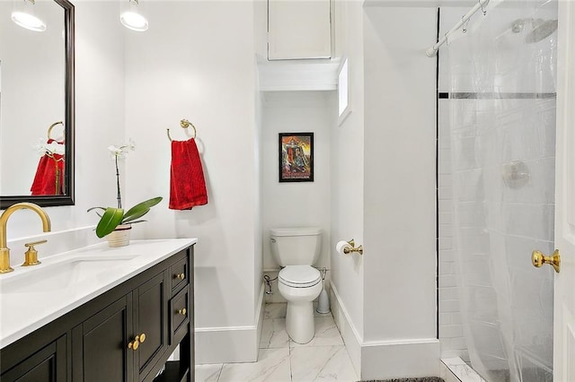 bathroom with marble finish floor, toilet, a tile shower, vanity, and baseboards